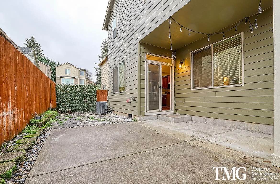 2 story house with a garage and three roommates who all became good friends after a year of living with eachother.