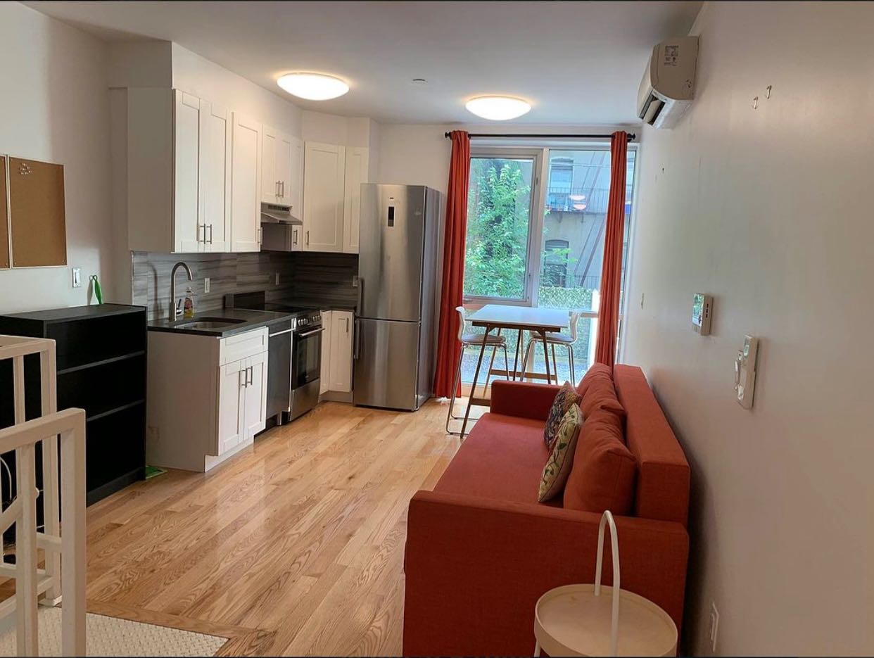 The apartment is located at 687 Driggs Ave, Brooklyn. It is at the Williamsburg neighborhood. It is also 5 minute walk to Bedford L Train or Marcy J or M Train, 10 minutes to the city.
The elevator building has amenities such as a Virtual Doorman, a Common Roof Deck, Bike, and Storage Room. There is off site super and the building is pet friendly.
The apartment features a beautiful kitchen with lots of cabinet space, a dishwasher, inducto cook top And stove as well as Wall to Ceiling windows South facing the garden The apartment has it’s own washer/dryer combo unit. The unit features a spiral staircase which leads to a REC Room and large backyard.
