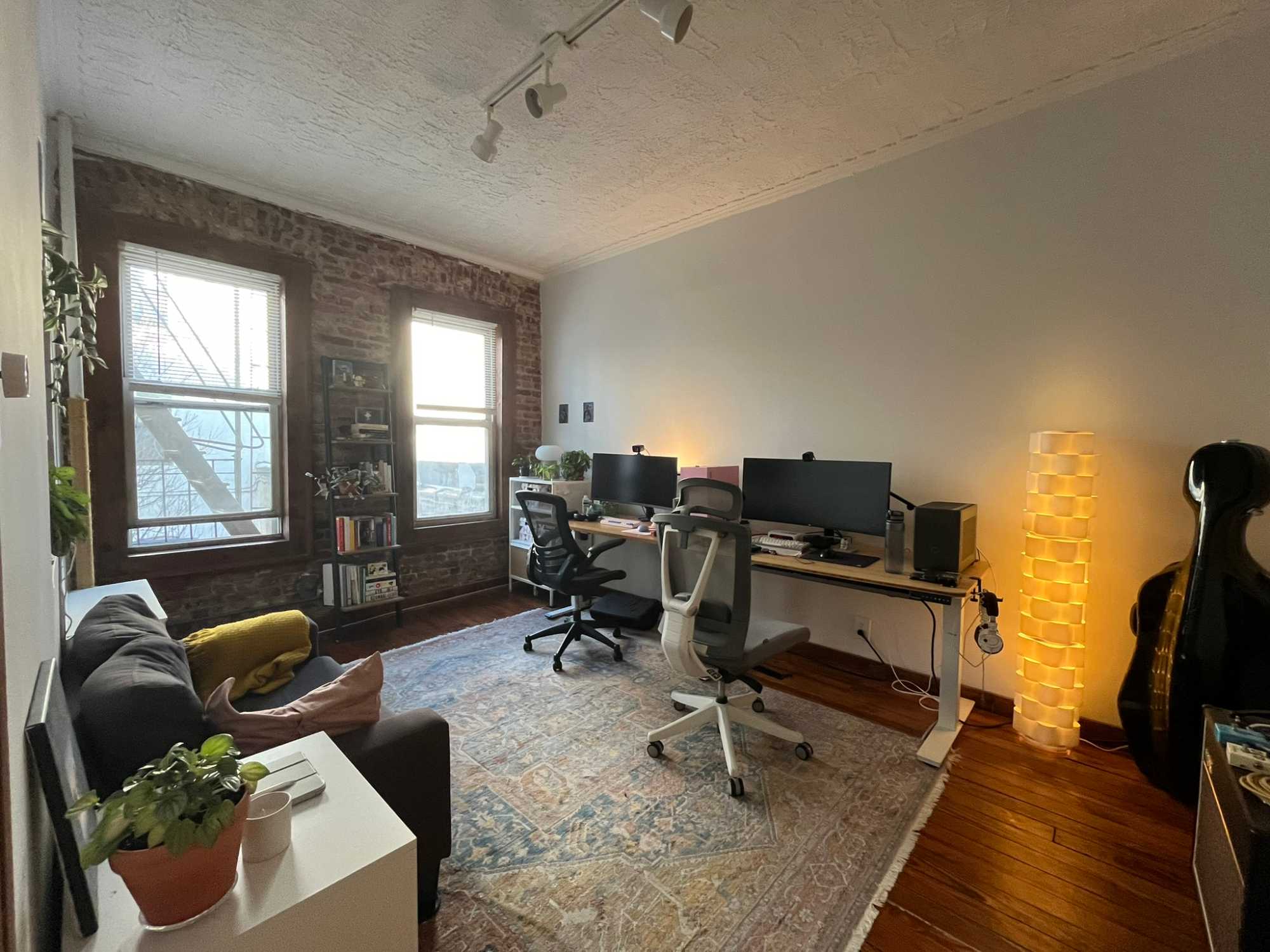 About the place: The apartment is on the 2nd walk-up floor of a townhouse building on the edge of Kensington and Borough Park. It has two big rooms and one smaller room which is used for common storage and a large, charming kitchen & huge living/dining area. The living/dining area and kitchen are already furnished with a full dinner set, vinyl record shelf, couch, coffee table and rug and a TV console with a large TV, so you wouldn’t need to bring anything with you except the stuff for your room! The building just got sold so I don’t have a lot of info on the new landlords yet, but the previous ones have maintained it very well. There’s also a washer/dryer + bike storage in the basement.
The room: Room is large and is approx. 15’ x 10’ (can definitely fit a queen with lots of space left for other furniture) with two windows facing the backyard (northeast-facing, so you get morning sunlight). It’s the quietest of the two rooms and is closest to the bathroom and kitchen. You also have access to the fire escape which goes up to the roof.
About me: I am 30 years old working in architecture, and work remotely on Mondays/Fridays usually. I’m very sociable but also respectful of your time and space. Ideally you have a stable job where you can comfortably pay the rent, and you would want to have a connection with the people you live with, so if you want a totally separate existence you probably won’t be a good fit - would much prefer someone who is communicative as it would make sharing common spaces better for both of us! I’m also 420/LGBTQ+ friendly/leftist so ideally you are as well. I’m also ok with pets on a case-by-case basis.