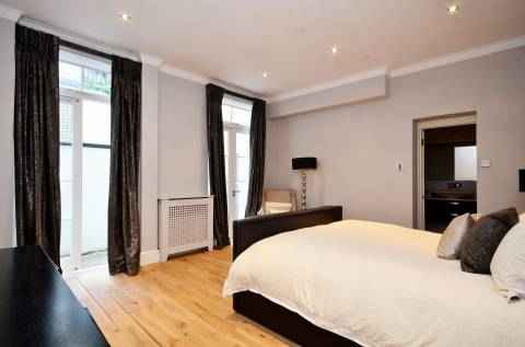 Newly renovated, gorgeous, quiet, clean, very bright & sunny large 2 bedroom apartment facing the street with a living room & open kitchen with bar:
Kitchen:
* Top of the line stainless steel appliances including refrigerator and range
* 42" Custom made cabinets with self closing doors
* Open kitchen bar
Bathrooms:
* 20" deep acrylic tub
* 24" solid wood vanity
* High grade fixtures including porcelain tiles
Living room/bedroom:
* 10 foot ceilings throughout the apartment
* Blinding sun light throughout the apartment
* 8 foot solid core closet doors with shelving in bedroom and living room
* Washer and dryer in the apartment
* Wide planked first quality Oak flooring throughout bedroom
* Floor moldings throughout
* Recessed Lighting
This 4 story walk-up apartment building is located on a prime, tree lined quiet block in the heart of Crown Heights near all shopping, boutique stores, restaurants, schools, a short walk to the Brooklyn Botanical Garden, the Brooklyn Museum and Prospect Park and the # 3 & 4 train line placing you within 20 minutes of downtown Manhattan.
The building has a full time repairman and superintendent and is lit up at night like Times Square.
* Full time repairman and superintendent
* Front of building is lit up at night like Times Square.
* Pets Allowed
* Guarantors are accepted nationwide!
* Heat & hot water included.