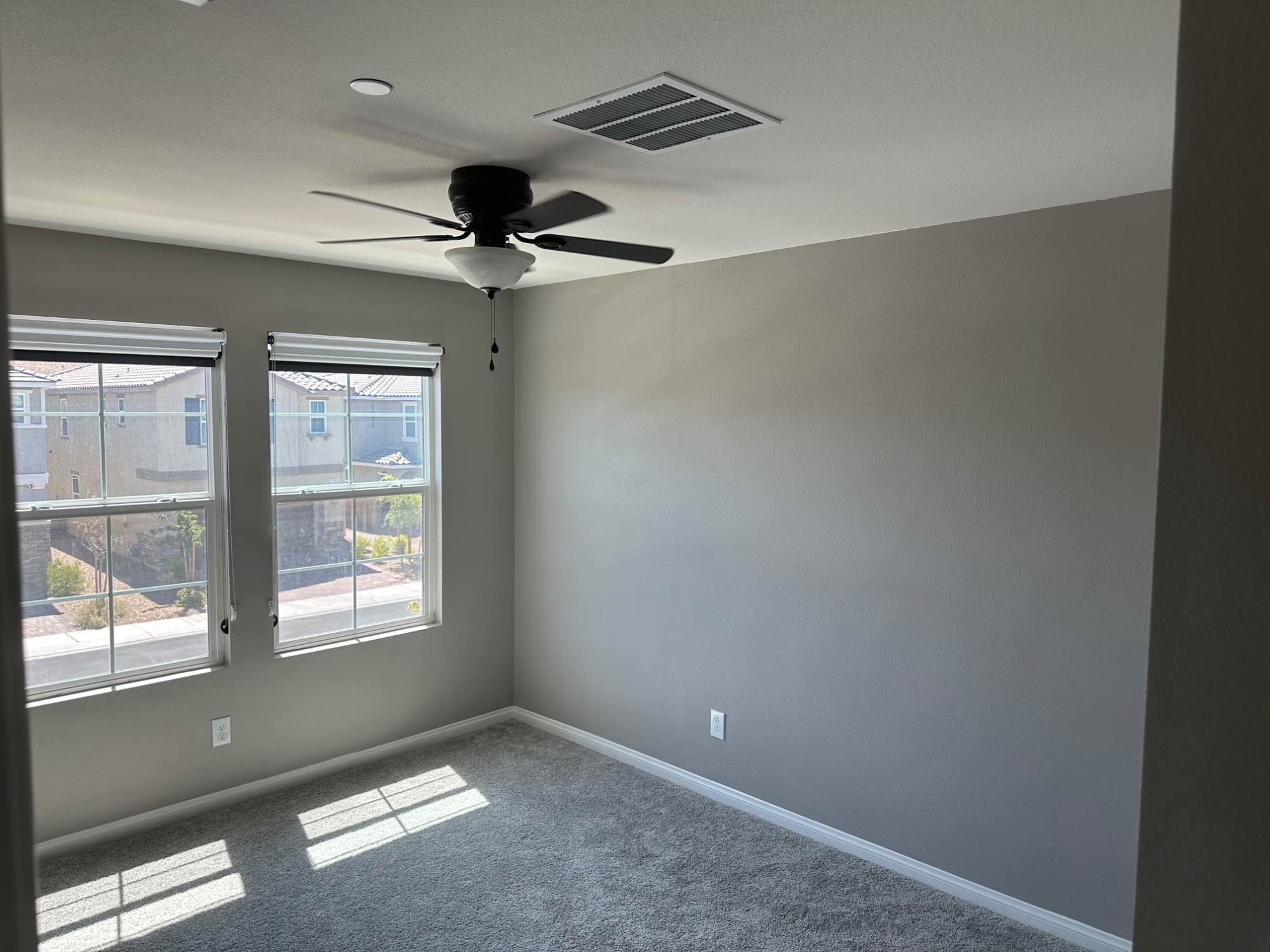 2,100 sf two story house with 4 bed rooms (my room, guest bedroom, office, and your bedroom) in a new community with a lot of hiking trails, parks, pools and sports courts nearby. There’s a fully furnished kitchen, living room and loft that are all communal. Half of the parking garage is available to use for storage or parking. The bedroom and bathroom for rent are accessed off of the loft. There is a backyard, but it’s currently just dirt… it’s too hot out anyway. If you plan to stay for 6+ months then I can get you a pass to access some of the pools.
The room itself is 11’ 9” x 10’ (carpeted) and fits a queen comfortably. There are two closets available, one in the room and one in the office next door. Both are about 6’ long.