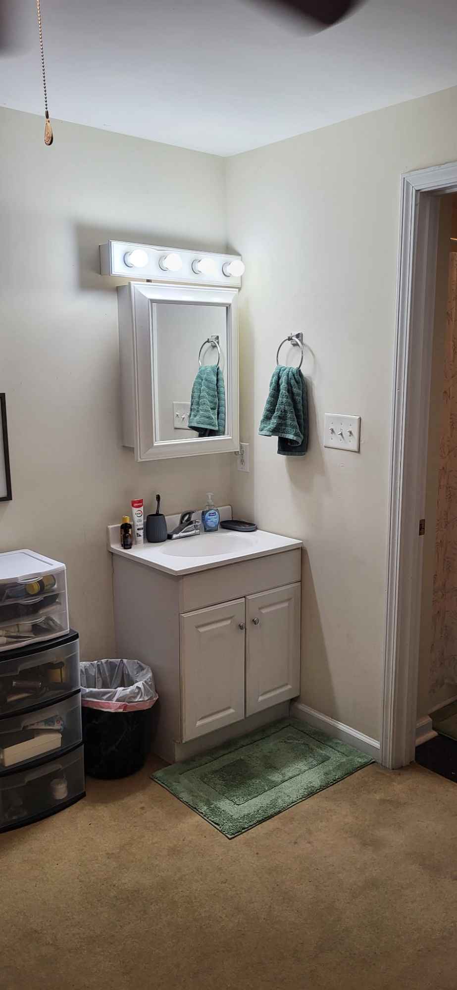 This is one bedroom with a private bath in a house. The room is not furnished. Someone is currently living in this room. The things in the pics are his. 