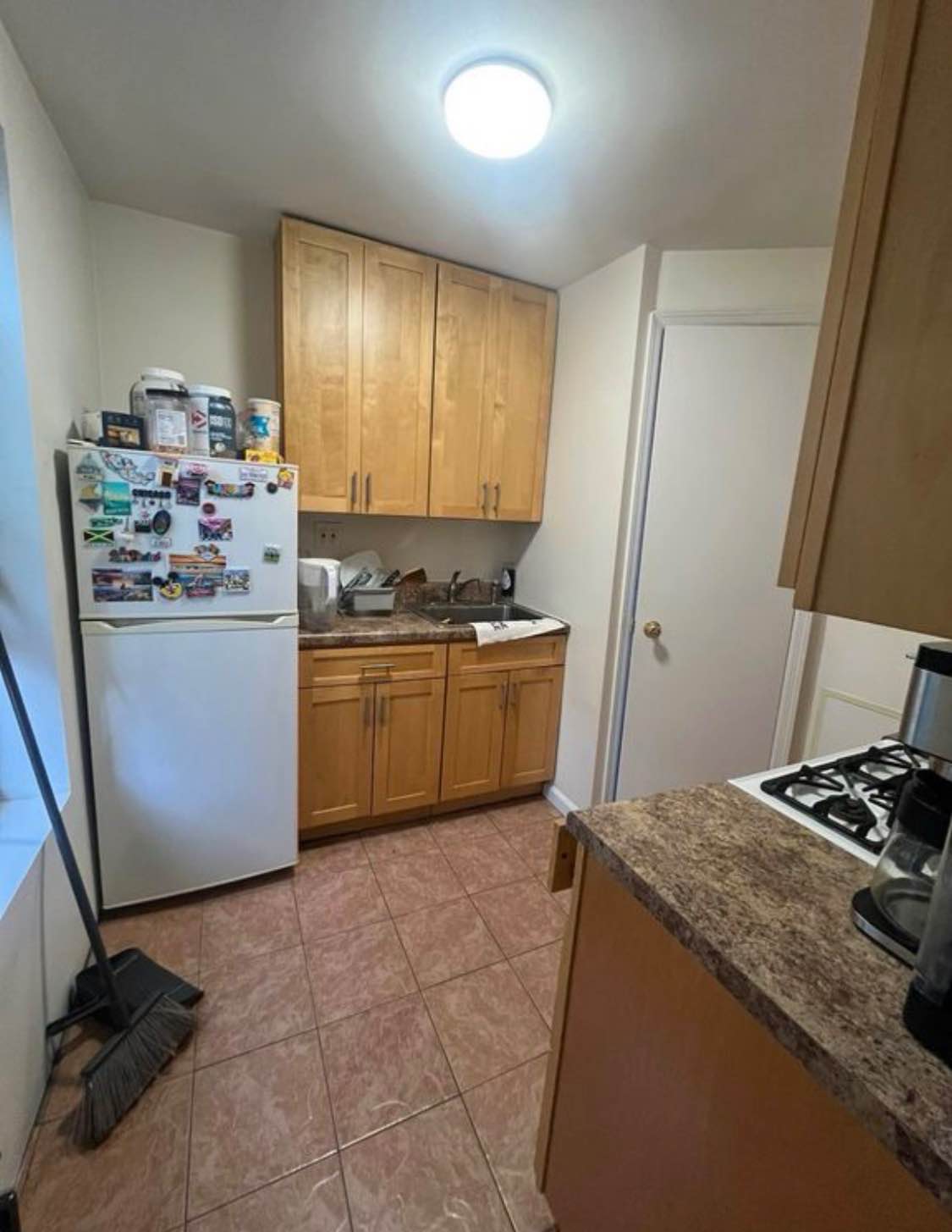 This apartment is a fantastic find, with a layout that makes the most of every space. The main living area has beautiful hardwood floors and a comfortable sectional couch, perfect for relaxing after a long day. The large closet provides ample storage. The space flows nicely into a dedicated dining area, complete with a modern table and chairs and a decorative bookshelf.

The kitchen is efficient and practical, featuring wooden cabinets, all the necessary appliances, and a good amount of counter space. You'll also love how much natural light comes in.

The bedroom is spacious and bright, with large windows that let in plenty of sunlight. There's enough room for a big bed and even a separate desk setup for working from home. Lastly, the bathroom is well-maintained and clean, featuring a standard setup with a shower and a vanity for storage. This apartment offers a great combination of comfort and privacy.

Reach out for details and requirements .