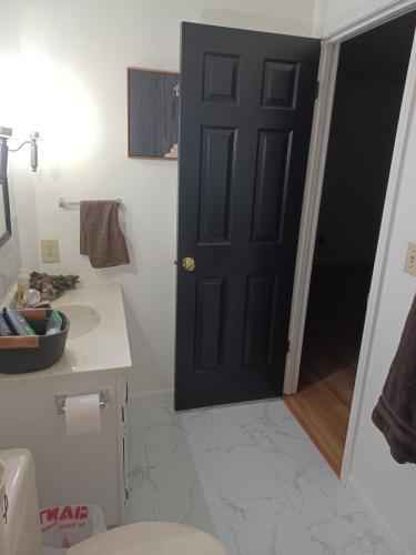 This private studio offers an ideal blend of comfort and privacy. It comes with its own bath, modern kitchen, and private closet, ensuring no shared spaces with other tenants. This spacious, fully furnished studio can also be arranged unfurnished if you prefer. High-speed WiFi and an in-unit washer/dryer are included, and there is convenient parking available. The lease is month-to-month, though other lease terms can be considered. Pets are welcome, provided they’re well-trained.