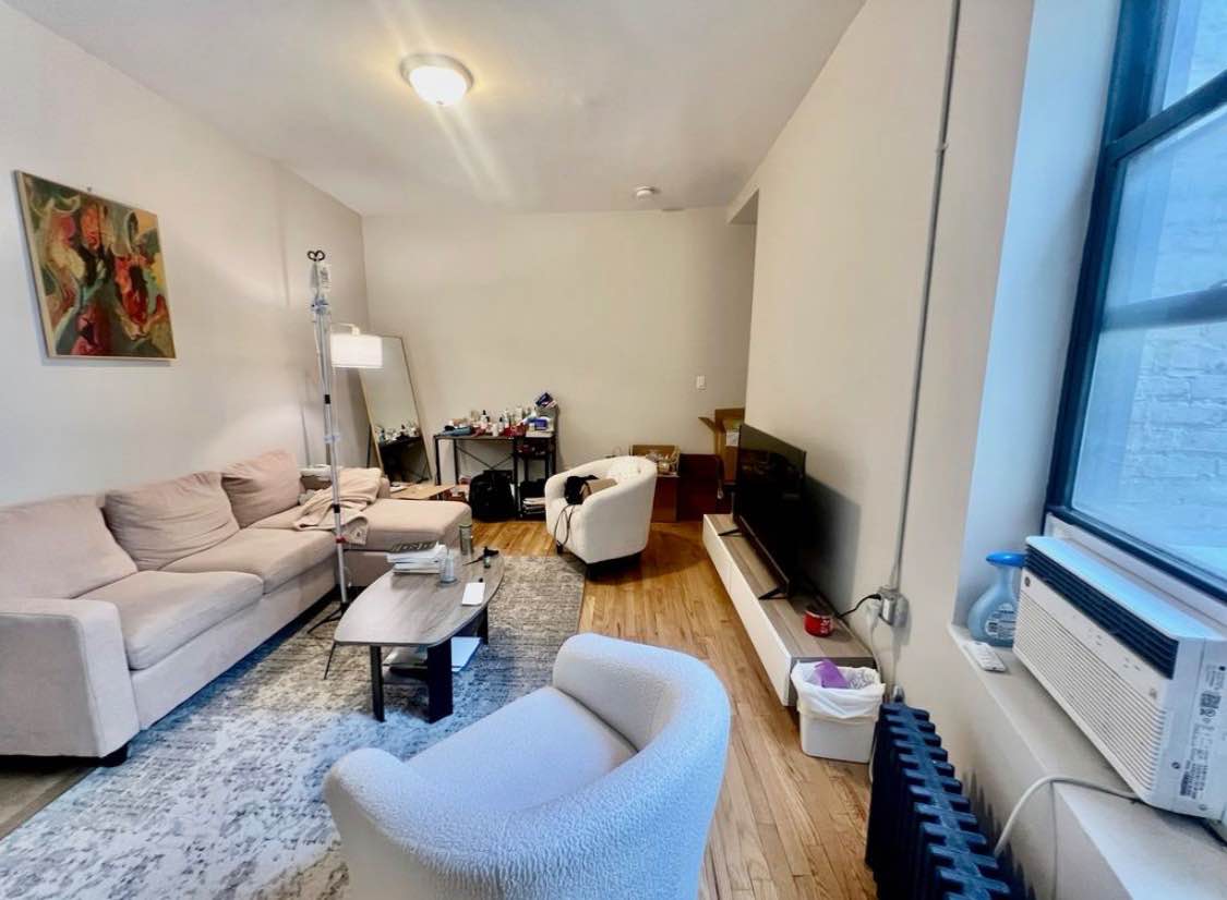 Hi,
This my lovely apartment is available for occupancy.The living room is where I love to relax on my big, plush sectional couch, which I've paired with two cozy white accent chairs to create a comfortable space for friends. The hardwood floors add a warm, inviting feel, and I've placed a rug down to define the seating area. My TV is set up on a low console, which keeps the space feeling open. The kitchen is my personal cooking sanctuary. I love the clean, modern look of the white cabinets and the diagonal tile backsplash, and the wood shelving is perfect for displaying my favorite jars and spices. I've found that this galley layout makes it really efficient to move around in. In the bedroom, I've kept things simple and calming with a neutral color palette. The bed is the central point, and I've hung some minimalist line art on the wall that I feel reflects my style. It’s a great, quiet space to decompress. The bathroom is clean and functional, with a classic tub/shower combo and simple white tiling that gives it a fresh, bright feel.
Seeking a clean and calm candidate to lease.

Best regards 