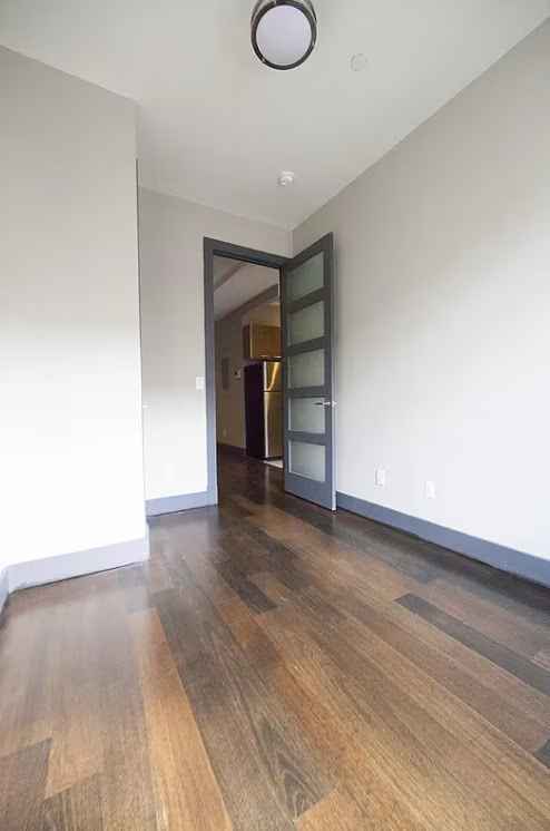 Spacious room available in a modern apartment building (less than 10 years old) in East Williamsburg. The building is conveniently located within an 8-minute walk to the L, M, J, and G trains and just 4 minutes from Food Bazaar.

The available room includes a window and closet, and the building offers laundry facilities in the basement.

The current lease runs through January 31, 2026, with the option to extend afterward. There is also a $500 sublease fee.
