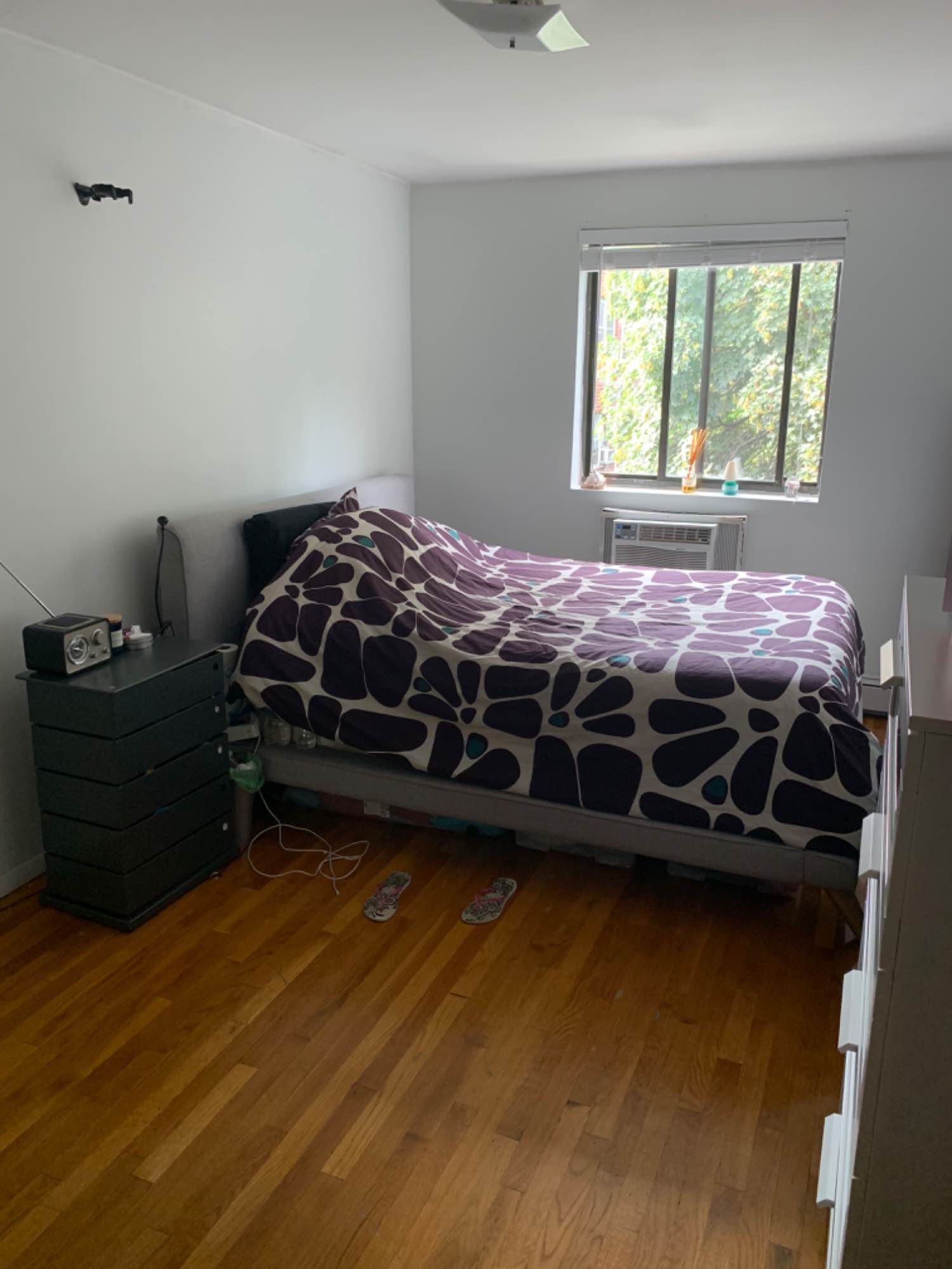 Renting a large size, unfurnished room with private bathroom in woodside, queens. It's a 3 bedroom/2 bath apt with balcony that you will be sharing with two working adults in their 30's. Third floor walk up, market, gym and laundry close by, less than 10 min walk from the 7 train on 61st stop. Rent is 1,300 includes wifi and gas, electric split 3 ways. The room has a good size closet and ac. We are quiet, hardworking people, we clean after ourselves and ask the same of you. Smoking at the downstairs only. No pets, the room is for one person only. No live in boyfriends/girlfriends. Looking for someone long term, that works full time (not remote) and can pay the deposit and rent on time. Proof of employments and references asked. Contact by email if interested. Move in December or January.