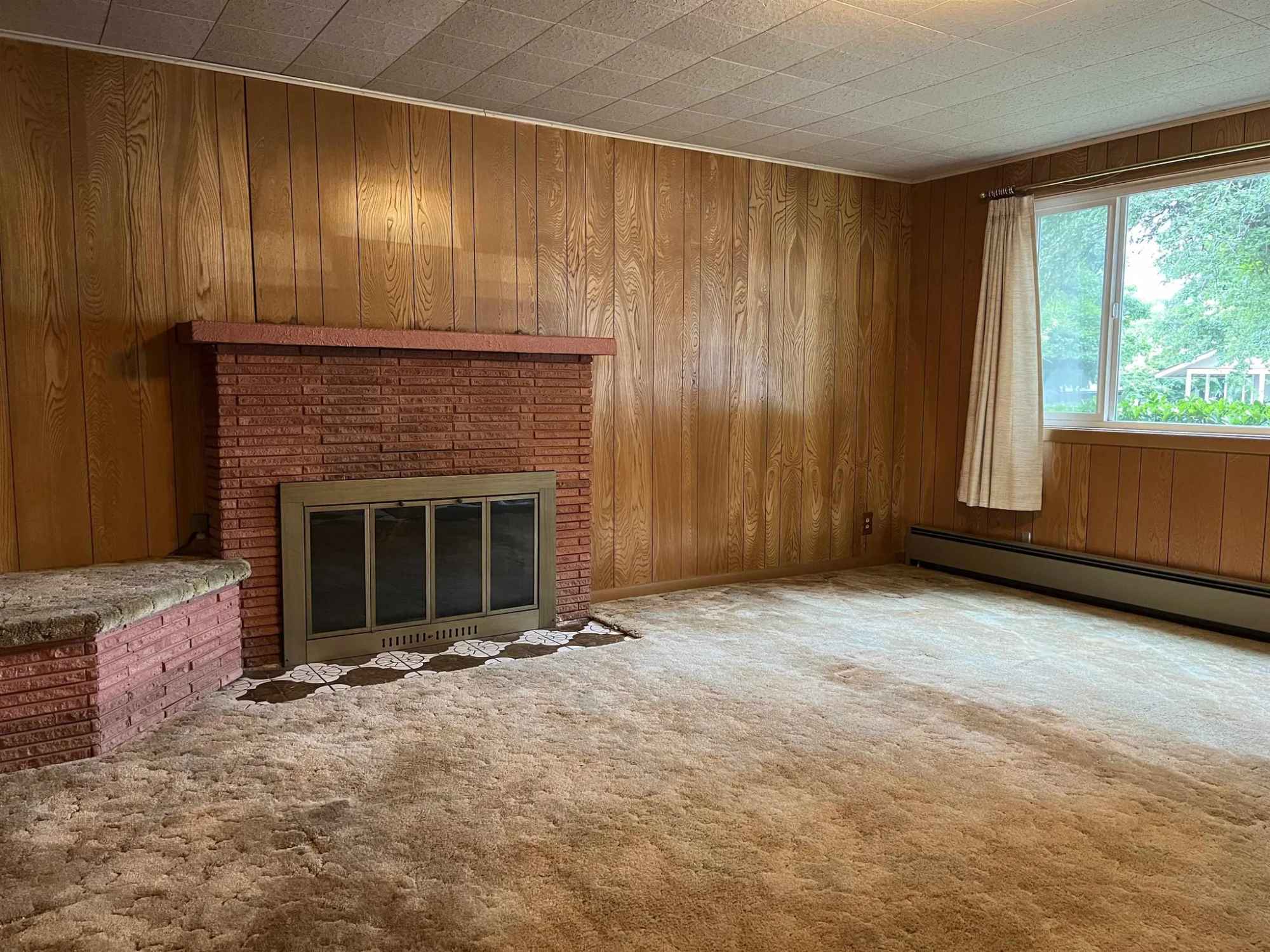 Cosy 2-bedroom, 2-bathroom home features a detached garage built in 1981, perfect for parking or storage, and a separate workshop/shed for hobbyists or additional workspace. Step outside to your own private oasis, complete with a garden area, vibrant perennials, and a variety of mature fruit trees, ideal for gardening enthusiasts or those seeking a sustainable lifestyle.