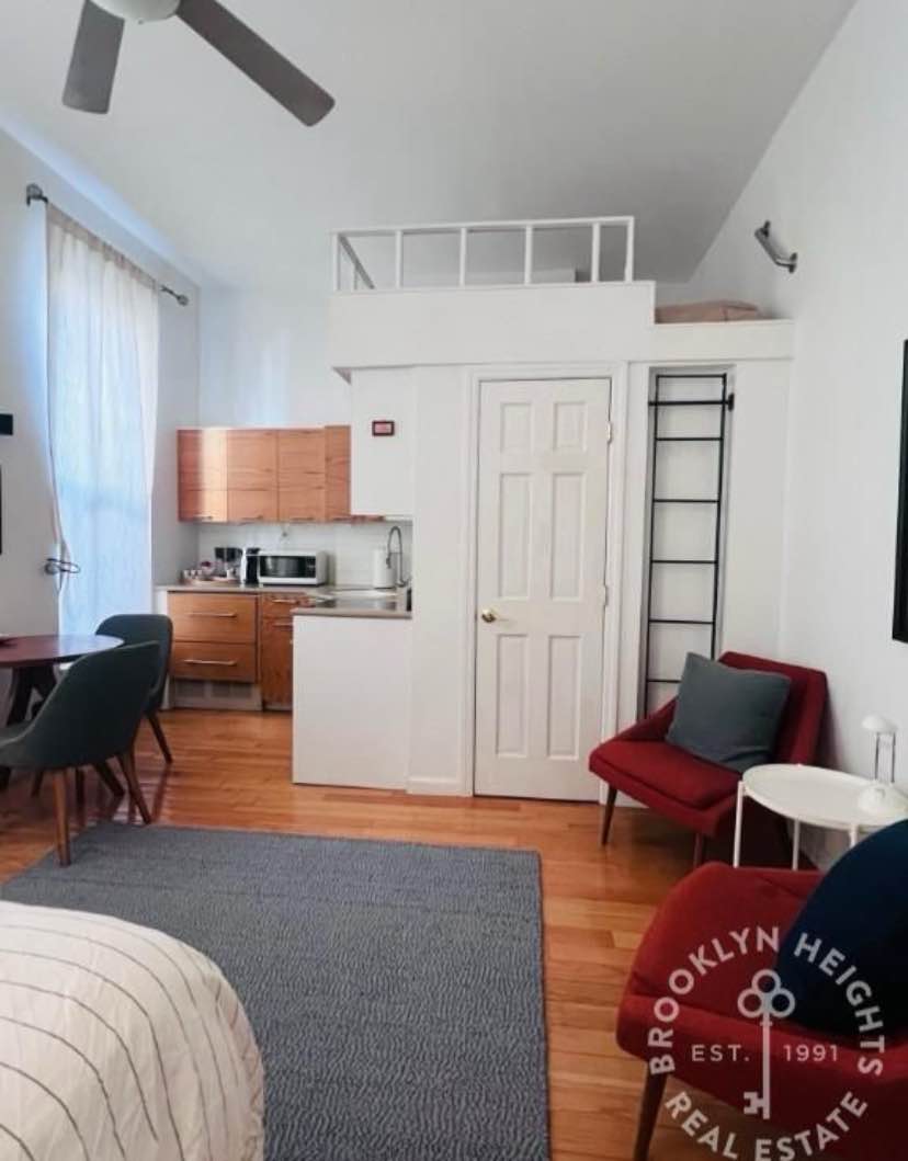 This charming parlor-floor studio, featuring high ceilings and a full renovation, is ideally located in the heart of Cobble Hill! Available furnished or unfurnished, the apartment boasts hardwood floors throughout, a beautifully updated kitchen and bathroom, and excellent closet space. The lofted area offers versatile use as either a sleeping loft or extra storage. Other highlights include 10-foot ceilings and three large south-facing windows that flood the space with natural light