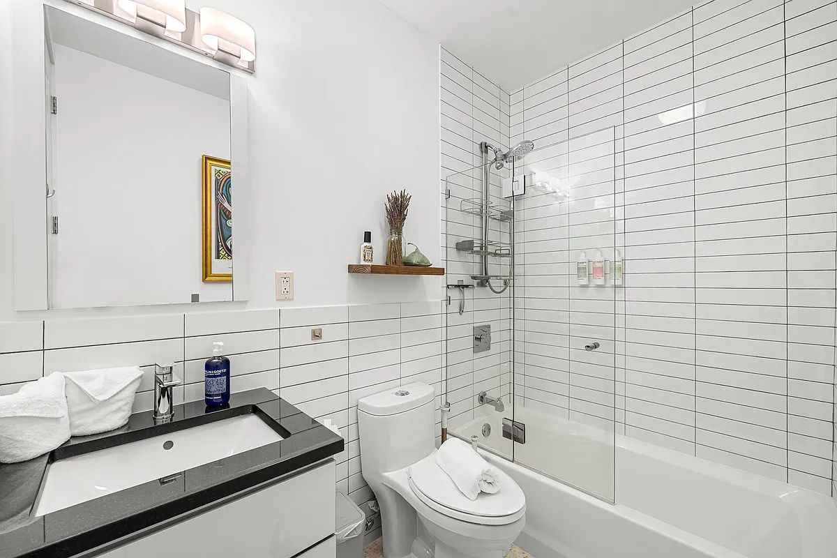 This is a charming 2-bed, 2.5-bath upper duplex nestled within a three-story townhouse in Bed-Stuy. The first level greets you with an open-concept living, dining, and complete kitchen filled with natural light and high ceilings. Enjoy an access to the private deck and fenced-in backyard. Upstairs, you' ll find two generously sized bedrooms and two bathrooms and an in-unit washer/dryer. The bedroom available for rent features a queen bed, a closet, and a comfortable sofa for lounging. An adjacent full bathroom with a bathtub and shower combo serves this room. kindly reach out to me via e mail (bdang7399 @ g mail . com ) for more info. Thanks