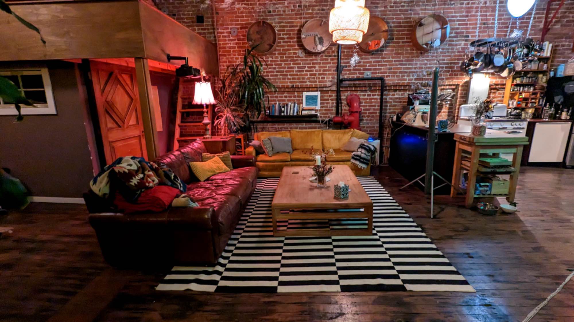 This gorgeous artsy loft space is located between West Oakland BART and Jack London Square with easy access to transit and freeways. This is a very special space that has been a live-work since the 1980s.
The bedroom is downstairs off of the shop space. It has a window into the studio but not directly outside which makes it much quieter but not as bright. The downstairs space stays really cool in the summer while the upstairs gets a little warm. This is the best room for sure! There is a ladder to the loft bed, fyi.
You would be living with one other person. I'm a professional artist, underground event collaborator, and college professor. I have a dog but can't have any additional pets unless they're in an aquarium or something. I have my art studio in the space but unfortunately there isn't room for another art operation in here so if you need workspace you will want to have a separate studio. That said, there is space upstairs to spread out and do a project or have a craft day with friends for sure! That's something I really enjoy doing.
My community is pretty interesting. Lots of boats and campouts and underground art stuff. It's pretty fun, I think you'll like these folks. I run with a very queer, adventurous, and respectful crowd. I'm looking for someone who wants the same.
We have a guest room as well so if you have friends in town they can stay with us :)
If you're interested please reach out and tell me a bit bout yourself including you job, work schedule, and lifestyle. Please include your ideal move-in date as well. I want to live with another professional adult. I'm 45.
Advantages:
Off street parking (not gated)
Washer & dryer
Central heat
Great place to cook and entertain
Walk to BART
Bike Anywhere
Disadvantages:
Industrial noise: BART, trucks, trains
Sound travels in the spaces we have to be considerate or each other's needs