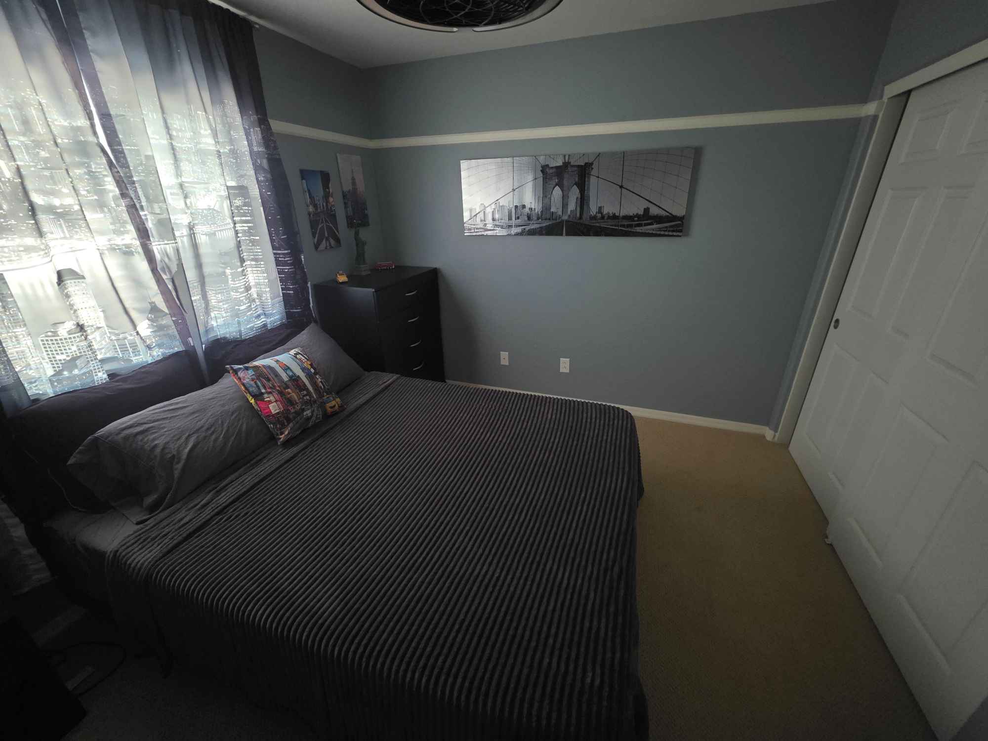 This is a single furnished bedroom styled with a modern New York theme. The room shares a bathroom and comes with access to in-home laundry. Utilities are billed separately. Dinner is cooked nearly every night, and tenants have the option to buy in if they’d like to join. You’ll also have your own designated food storage if preferred. Street parking is available, and tenants are welcome to enjoy all common areas of the home, including the backyard amenities.
We do have two lovable dogs, no additional animals are allowed. Smoking is not permitted.