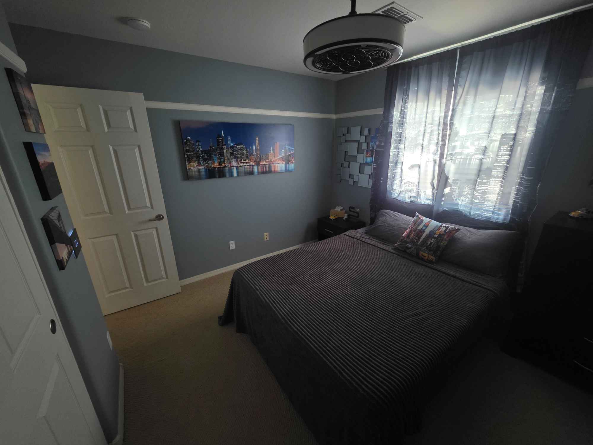 This is a single furnished bedroom styled with a modern New York theme. The room shares a bathroom and comes with access to in-home laundry. Utilities are billed separately. Dinner is cooked nearly every night, and tenants have the option to buy in if they’d like to join. You’ll also have your own designated food storage if preferred. Street parking is available, and tenants are welcome to enjoy all common areas of the home, including the backyard amenities.
We do have two lovable dogs, no additional animals are allowed. Smoking is not permitted.