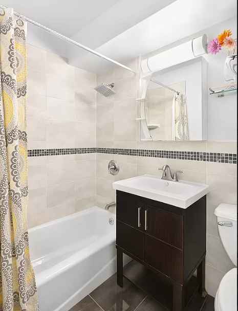 I own a large two bedroom/two bathroom apartment in which I reside alone. The apartment is located right by almost every subway line N/R/Q/B/D, A/C/E and 2/3.
Apartment is located in University Towers in Fort Greene/Downtown Brooklyn, one block away from Fort Greene Park. My apartment is gorgeous with amazing furniture and appliances, including a new dishwasher. Laundry room is on the premises.
The coop has 24 hour security, fitness center, a package room, outdoor grilling area, and onsite parking. No pets or couples. Not suitable for children.
The spare bedroom, which would be yours, has its own private bathroom and plenty of closet space. It is also quite large, and has an in wall air conditioner already installed. The room is currently lightly furnished, but I don't mind removing the furniture that is currently there.
I have a 75 inch state of the art Sony TV replete with a surround sound system and a PlayStation 5. Also, fully equipped kitchen and a lovely dining alcove, as well as an eating counter.
The room is available now, and I can be flexible with a move in date or lease start date.