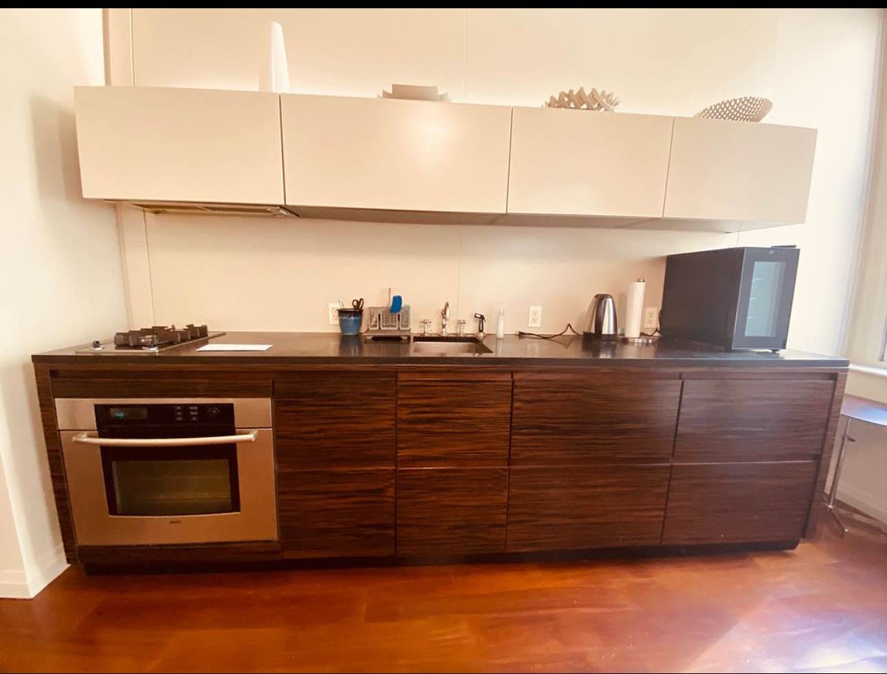 PRICED TO MOVE WITH PRICE! (ask us for details).
WON‘T LAST LONG AT THIS PRICE!
NEW to the market at the Exclusive Cipriani Club Residences is a spacious loft-like apartment.
FULLY FURNISHED AND WASHER AND DRYER IN UNIT.
Featuring 11 ft ceilings and 5 over sized (8 ft high) windows that overlook infamous Cipriani ballroom.
This large 638 square foot luxurious studio comes completely furnished with sleek modern furniture and includes all cutlery and linens.
ALL UTILITIES ARE INCLUDED IN THE RENT: ELECTRICITY, GAS, HEAT, CENTRAL AC, WATER, HOT WATER. YOU PAY NOTHING FOR THESE!
Private washer/dryer and a jaw dropping windowed bathroom with a huge Roman-style spa jacuzzi bathtub and separate marble stand up shower.
The white glove full service amenities include:
• The well renowned Cipriani restaurant and bar—room service available.
• State of the art health club
• Landscaped Residents’ Roof Deck
Even the corridors are unique as each threshold resembles British telephone booths dipped in Belgium chocolate wrapped in colorful foil.
Centrally located you will be just steps away from 11