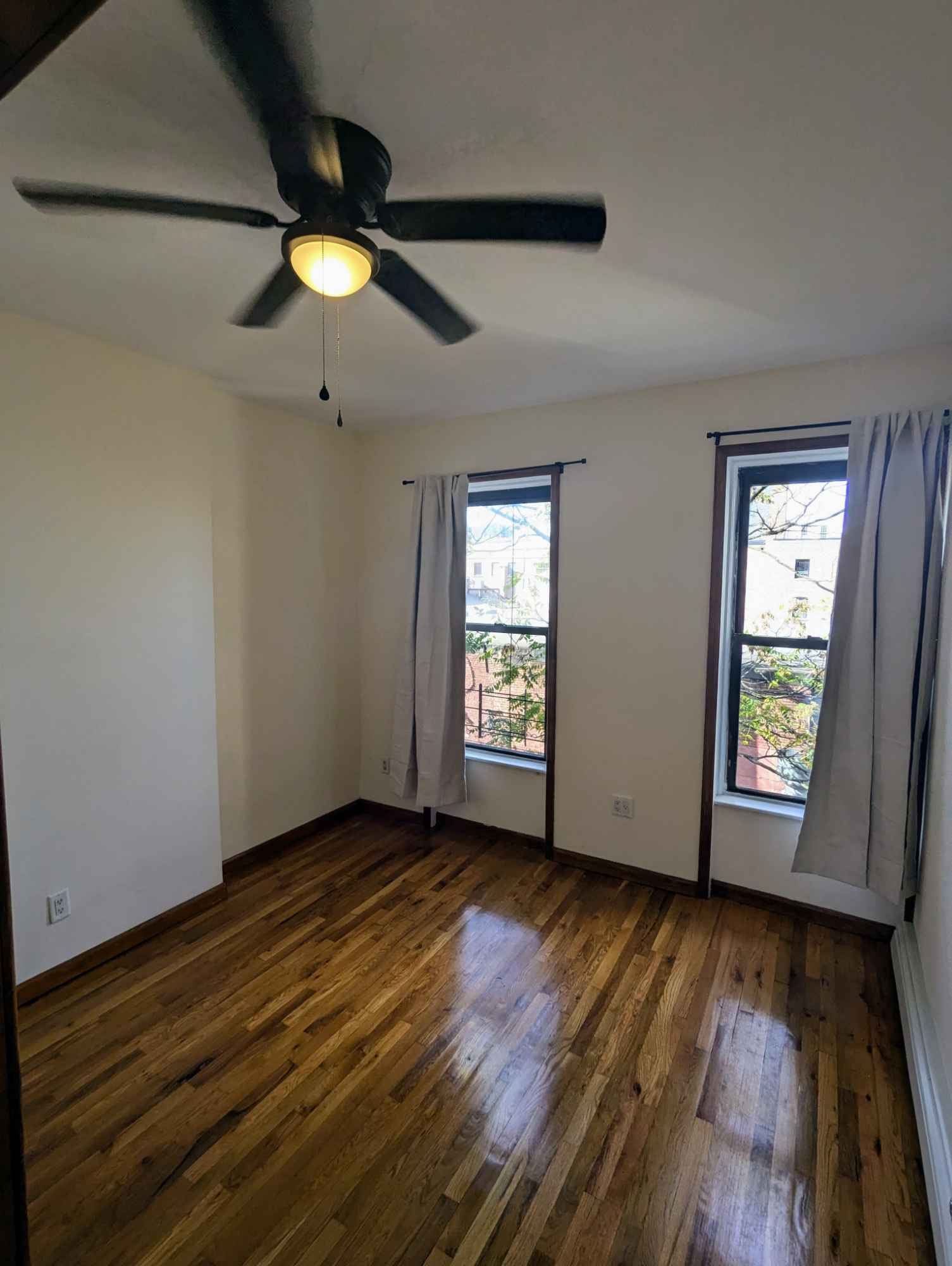 Sunny, large master bedroom with west-facing windows offering lots of natural light with views of harbor. Tons of storage space in room with large closet and generous upper cabinet. Room is unfurnished, and has enough space for king sized bed.

Utilities Included: Rent covers heat, electricity, gas, WiFi, and basic cable TV. 

Shared Spaces: Big living room and kitchen space, new kitchen appliances and plenty of cabinet storage. Bathroom with a shower/tub combo, updated sink and toilet, ceramic tiles, and a vent fan for good air circulation. 

Located on the 3rd floor of a well-maintained building with only two other units. Affordable laundromat just a block away.

Neighborhood Highlights: Located in the heart of Red Hook, Brooklyn – amazing neighborhood vibe! Walkable to nearby parks, restaurants, bars and stores, with everything you need within a one-block radius.

Transit: B61 bus and Citibike station to downtown Bklyn to access all the trains, or 15min walk to F/G train. NYC Ferry stop for Red Hook one block away.

IMMEDIATELY AVAILABLE and move in ready. Security deposit required upon signing. Lease term flexible for 3-months, 6-months or 1-year.