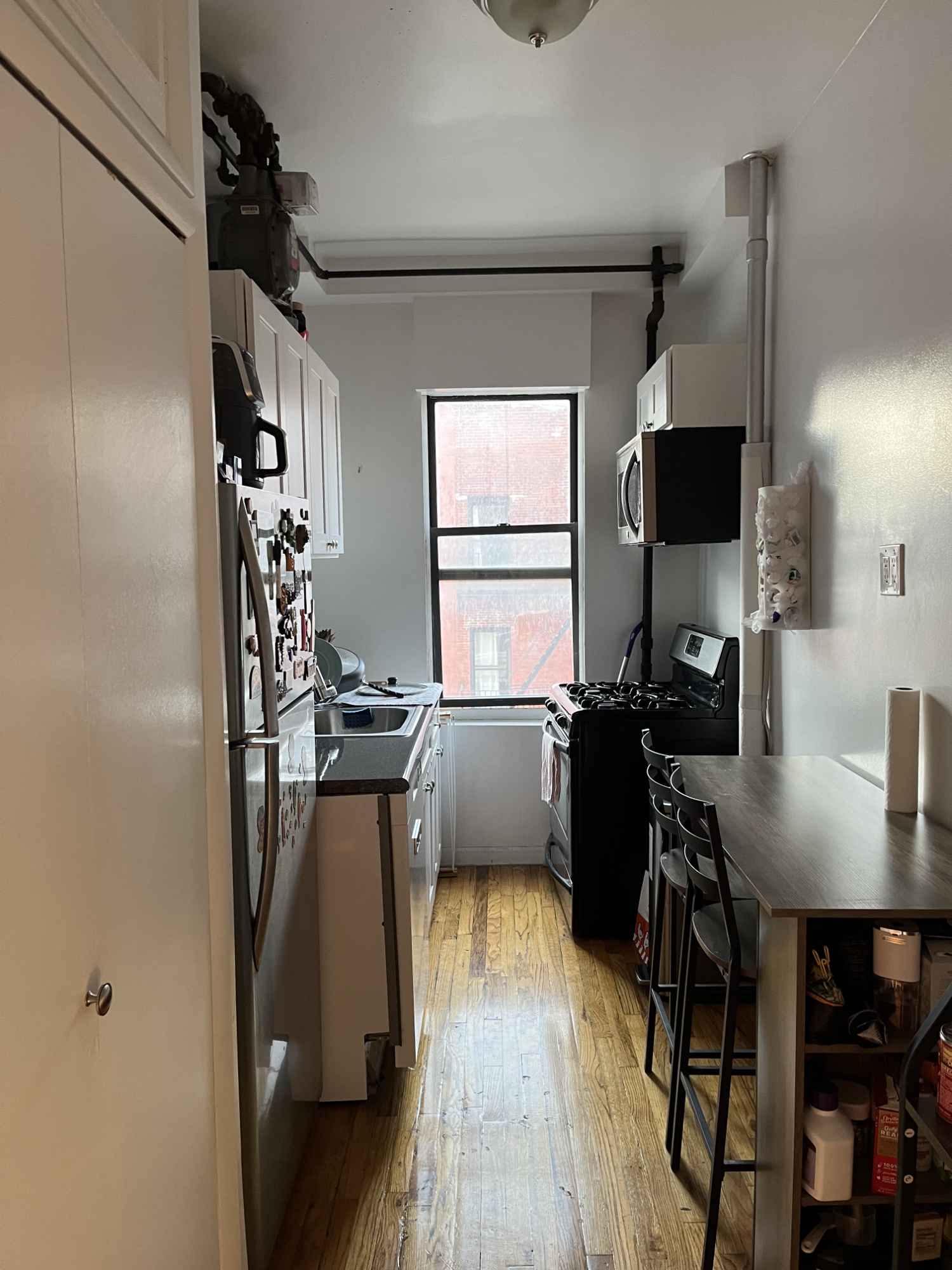 About the Room: Spacious closet, overhead storage space as well. 13’ x 7’1” (See floor plan, your room would be the one closest to the entry). Lot’s of natural sunlight. Can fit a full bed/dresser/bedside table (twin bed might be better if you want to fit a desk like in my current setup). Installed shelves already in the room! Passing along for free. Open to selling my twin bed frame, fabric dresser, and window AC unit at a reduced cost! (Possibly more too).
About the Apartment: 3 rooms total, 1 shared bathroom. 4th floor walk-up. In-unit washer & dryer. Modern kitchen with full dishwasher, spacious fridge, microwave, & gas stove. Living room with stunning views of midtown! Tons of natural sunlight in all the rooms. Rooftop access.