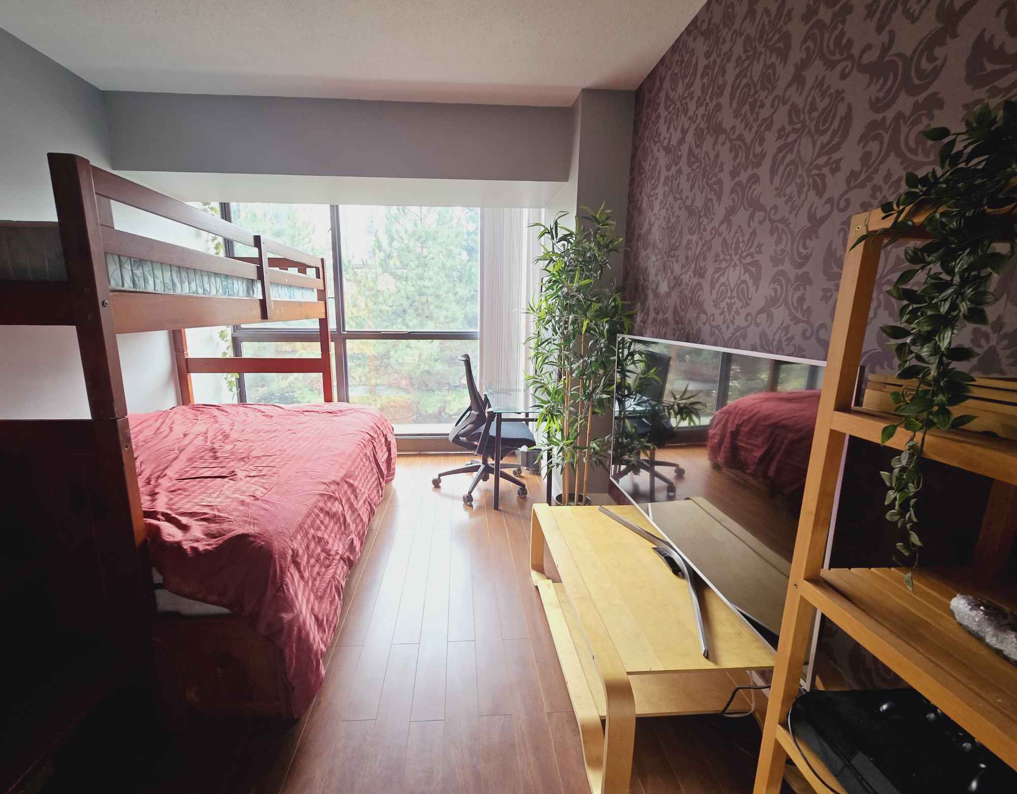 A downtown Vancouver furnished room is available on Nov 1 or Nov 15 (the Room is actually available immediately if you want to move in earlier). For short-term (minimum stay until Jan 31st) or medium/long-term rental. The building is directly beside the Yaletown Roundhouse Skytrain station.
ROOM
Spacious private bedroom (136 sq ft - 14.6 ft x 9.3 ft), your own 55-inch HDTV (Amazon Fire TV Stick for smart TV streaming apps), private bathroom, and private closet. The bed pictured is a double-size bunk bed (top bunk is good for more storage or if you have a friend visit), but we can swap that with a queen-size bed (some assembly required). Both beds have drawers for more storage. Additional storage is available in the living area and in the storage locker, if needed.
- 136 sq ft (14.6 x 9.3)
- Desk & Office Chair
- 55inch HDTV
- Amazon Fire SmartTV stick
- Large Closet with hangers
- Queen-size bed OR bunk bed (I have 2 different bed frames I can move into the room, bunk bed pictured)
- Both beds have storage
- Your own full bathroom with a bathtub, shower
APARTMENT
The room is in a VERY spacious 1302 sq ft 2-bedroom 2-bathroom apartment. The apartment has a view of False Creek. Shared kitchen and living room.
BUILDING
Building Amenities:
- Gym
- Pool
- Mini Sauna
- Hot Tub (currently in repair, no eta)
- Bike storage
- Storage locker
- Guest Parking
RENT
$1650 flat rent (EVERYTHING included!)
- Electricity/Heat/Water included
- Household supplies included: cleaning/lights/maintenance/toilet paper etc.
- 100 Mbps Novus Fiberoptic Internet
- Streaming: Netflix, Disney+, Prime, Apple TV, Crave. Apple Music, Crunchyroll included.
- Costco Membership! (cheap food!)
- Appliances: In-suite Washer, Dryer, Dishwasher
- Shared kitchen: Fridge, Oven, Microwave, Rice cooker, air fryer, milk frother, blender, spices
- Shared living room: 65-inch 4K HDTV Smart TV with cable, Xbox Series X with Game Pass
- Sharing books, movies, video games, and an extensive board game collection
- Note: no AC in unit
- No other monthly fees/charges, rent is EXACTLY $1650 (exception: if landlord raises rent by legal amount with notice given)
-It does not include a parking spot, but spots are available in the building for about $100 a month.
MOVE IN/OUT
- No move-in/out elevator fee as long as you have no furniture
- $800 damage deposit on move-in, returned on move-out
- $80 cleaning fee when moving out to hire a pro cleaning, unless you want to do your own really thorough cleaning!
HOUSEMATES
Male in his early 40s, MBA & BSC from SFU, works full-time in tech startup marketing.
Hobbies: Skiing, Photography, Karate, Travel, Art/Design/painting, Canucks/sports, Video games/board games.
Female in her 30s, Japanese, works in a daycare, likes anime.
This is a great place for a student, someone traveling, on a working holiday or temporary job, or needing an affordable place to stay while looking for a permanent place.
RULES
- No smoking
- No drugs
- Take turns sharing chores with no strict schedule
- Living downtown is supposed to be fun, so sometimes having friends over is ok, just no big parties unless agreed.
- Minimum 1 month notice required by either party to terminate the rental agreement.