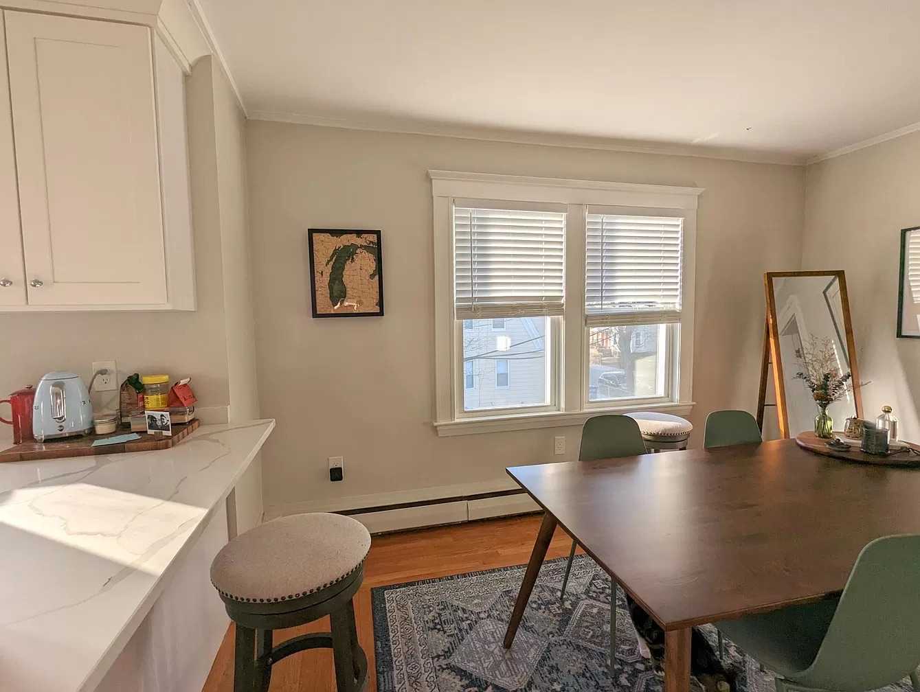 Hello! My future roommate and I (both working professionals in our late 20s/early 30s) have just signed a lease on a beautiful 3 bedroom, 1 bath in Somerville. We are looking for a preferably female-identifying roommate to join the lease ASAP for a June 1st move in (1 year lease 6/1/24 - 5/31/25).

The apartment is located in Teele Square in Somerville. It's on the corner of a quiet street just a block off Broadway, super close to many restaurants and a great coffee shop. Davis Square (red line) is an easy 15 minute walk away and the green line is a 20 minute walk. Many bus routes go through Teele as well. Street parking is plentiful in this neighborhood with a resident permit.

The apartment is newly renovated and has a great kitchen with a dishwasher (as well as living room and open concept dining area), in-unit washer and dryer, and a huge enclosed sunroom (second floor). 

The bedroom itself is cozy and will fit at least a full sized bed. It includes a good sized closet as well. The three bedrooms are slightly different sizes and rent will be split accordingly - this room will be $1125/month including cold water (total rent: $3750). 

One friendly cat will be living here with us so we hope you enjoy cats!