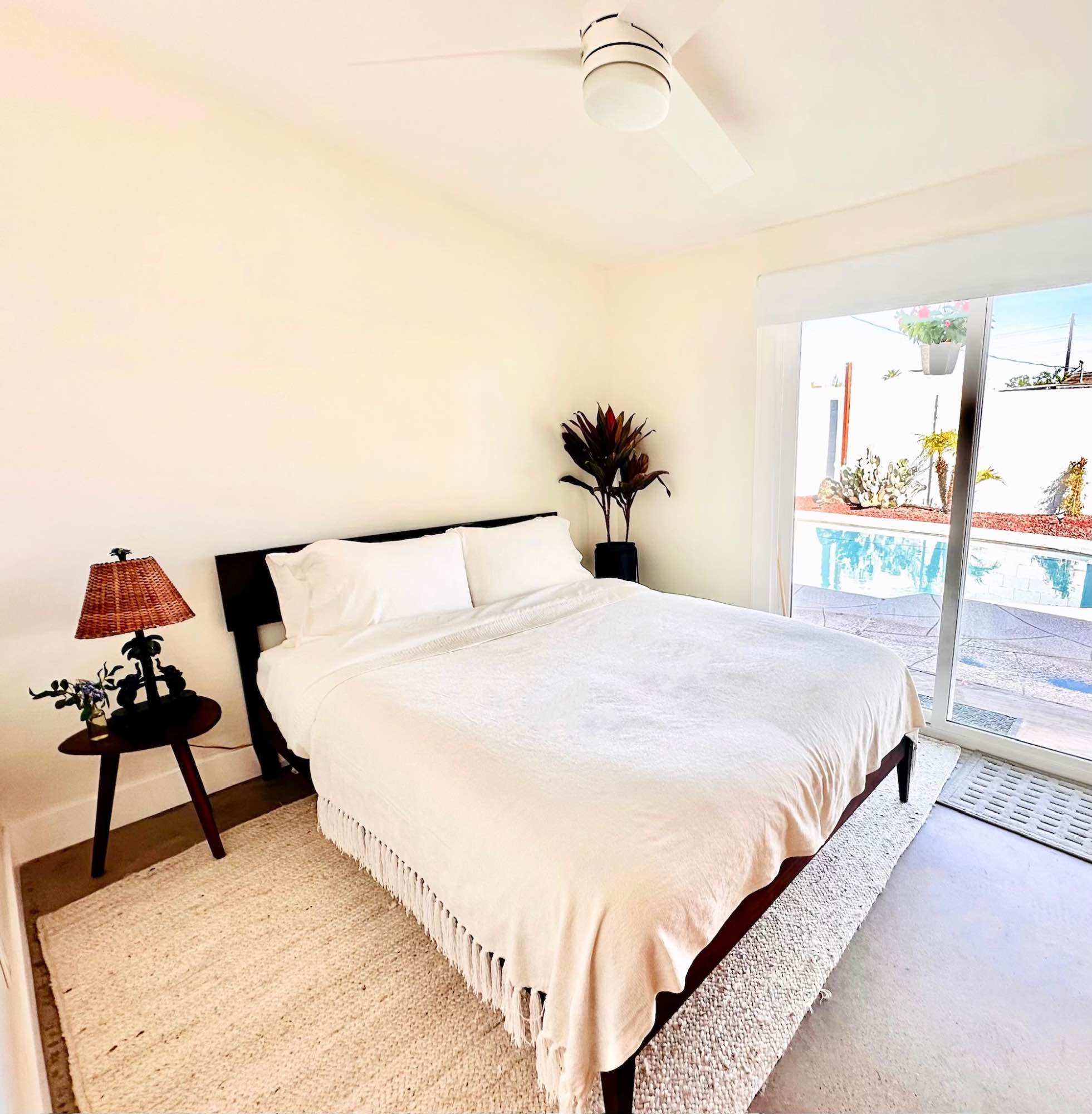 Welcome to our midcentury modern dream house! This airy room comes fully furnished with a queen bed, dresser, closet, storage, a glass door that exits into the backyard, and hallway access to a newly renovated large bathroom that is shared with 1 male housemate. The house is ranch style, with spacious common spaces, and natural light. You have access and are encouraged to use the pool in the backyard, invite friends over to lay on the lounge chairs or grill. There is a shared dining room, modern kitchen, and living room featuring a smart TV and cozy sectional. We are young professionals and roommates that hang out often. We each have dogs, one Golden Retriever, one Cavalier King Charles Spaniel and would love to add to our pack!