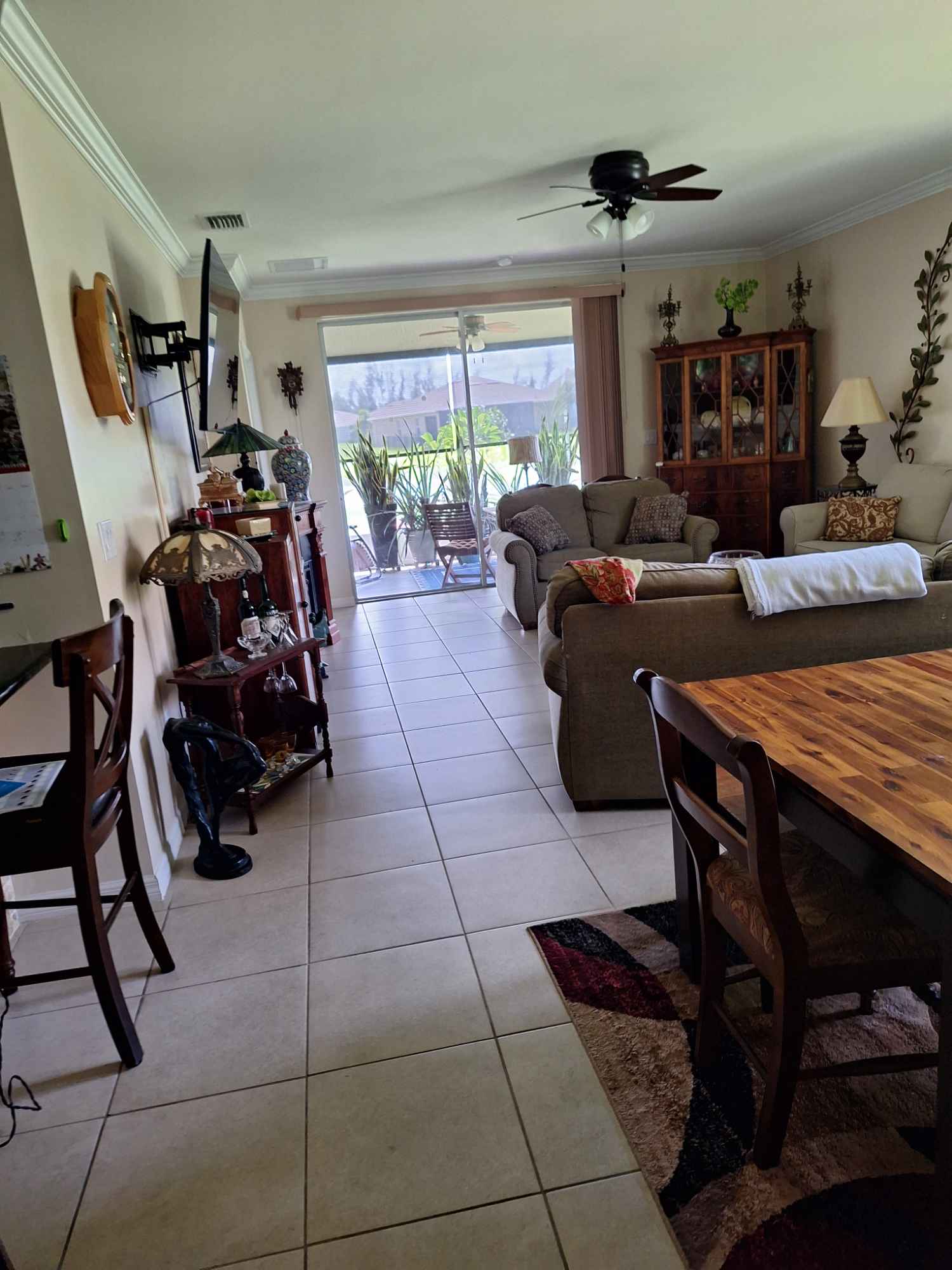 Share 3 bedroom home in private gated community.. completely furnished, all amenities, driveway parking.. LGBT friendly. Gym, olympic size pool club house.  Furnished bedroom/bath. Current share with 2 other men.. smoking allow on screened lanai only