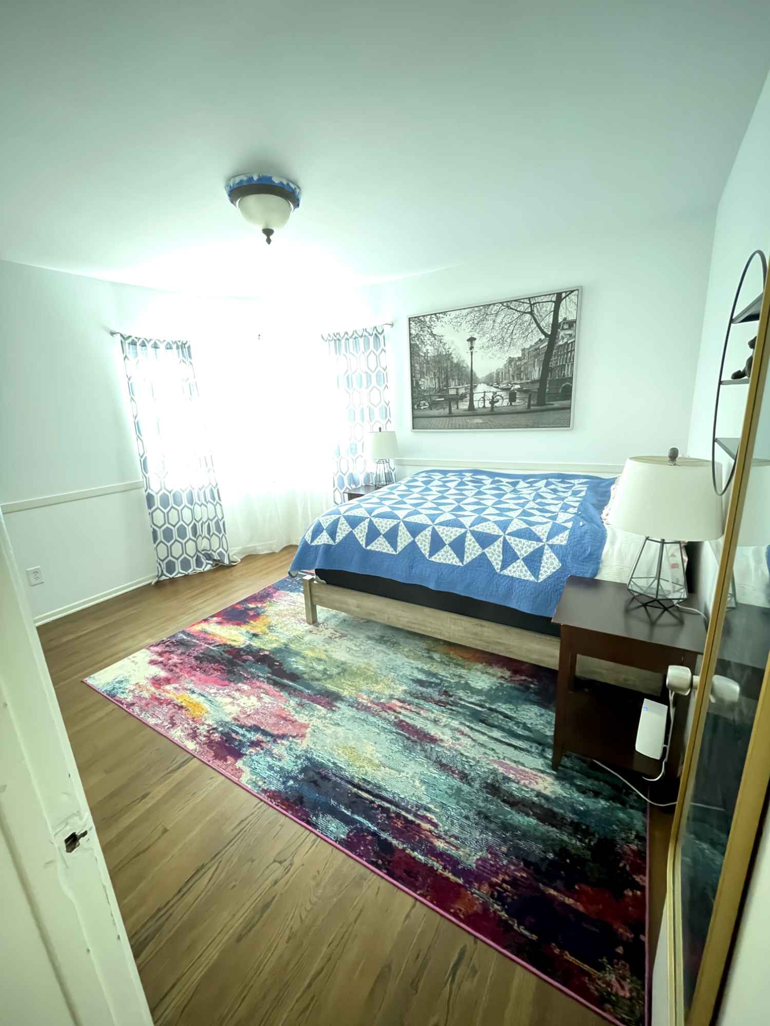 The room is west-facing with nice lighting.  The apartment is clean and comfortable with large windows and a front stoop and lawn. There is a shared bathroom with a standing-only shower and  a separate tub. I'm a respectful, tidy, friendly person and am looking for a roommate who is trustworthy, clean, and friendly.  I hypnotherapist by day, server at a restaurant by night so I'm gone a lot in the evening.  Please note there is NOT a microwave in the kitchen.