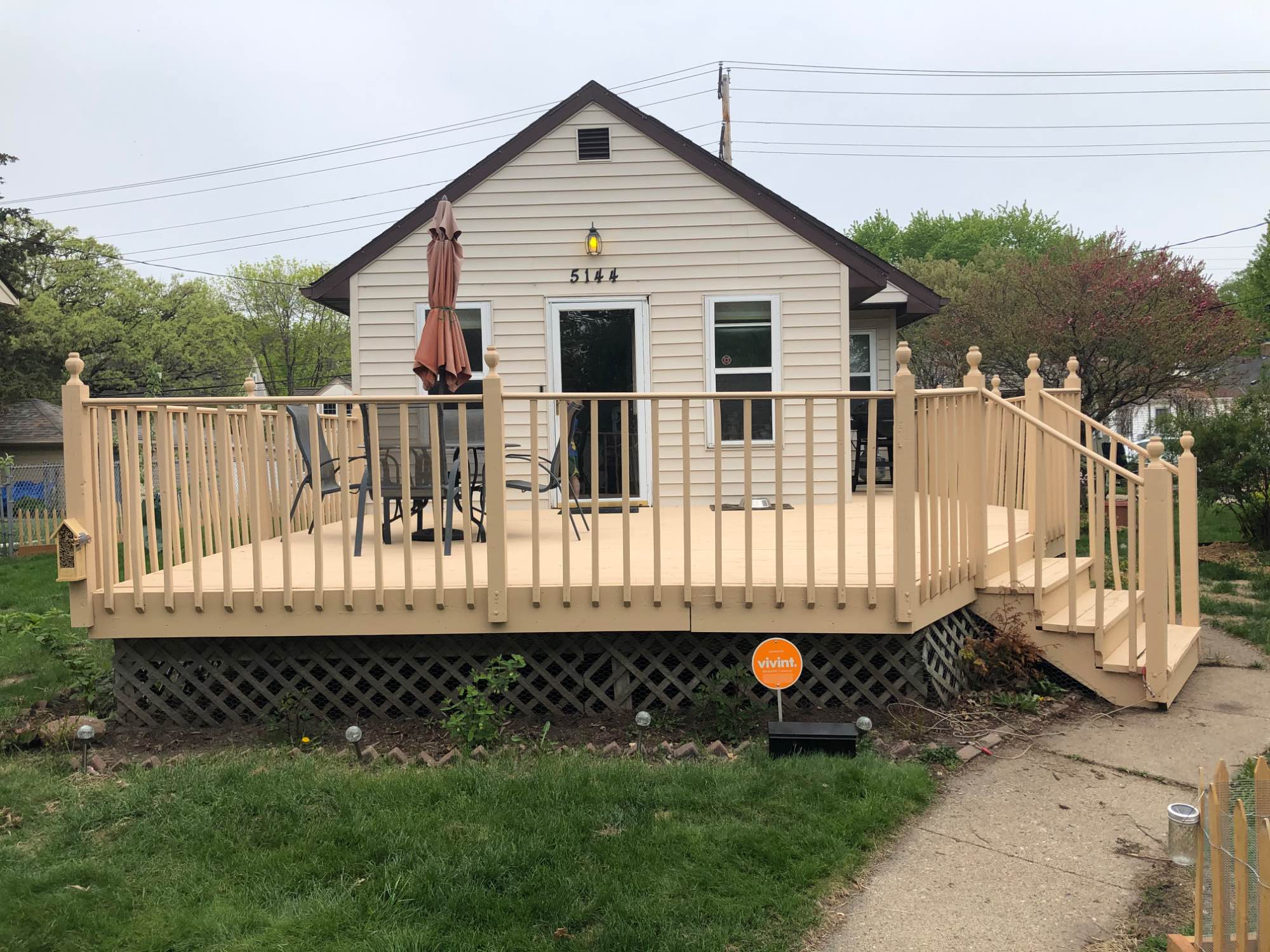 Welcome to our lovely room in Minneapolis, Minnesota! This cozy house is situated on a medium-sized lot that offers a peaceful and comfortable outdoor space. You can enjoy a breath of fresh air in the garden, relax on the large deck, or cook up a delicious BBQ on the outdoor grill. The beautiful yard offers plenty of space for outdoor activities and provides the perfect spot to soak up the sunshine.

The bedroom in the house features a full-sized bed, wardrobe, one nightstand, and a dresser, providing ample storage for your belongings. The bathroom boasts a shower-tub combination, a single vanity, and a toilet, ensuring your comfort and convenience during your stay.

The common areas are located on the ground level, which includes the living room featuring a comfortable couch, loveseat, side table, and ceiling fan. The dining area has a table with three chairs, making it the perfect spot to enjoy a meal with friends or family. The Kitchen is open-concept and boasts beautiful black appliances, wood countertops, and a bar with two stools. Fully equipped with cooking amenities, microwave, stove, fridge, and utensils, you'll have everything you need to prepare delicious meals during your stay.

The Floor has been laminated, adding to the stylish and inviting atmosphere of the house. Meanwhile, the Basement contains the Washer and Dryer units, ensuring you have everything you need for a comfortable stay.

Step outside, and you'll find a welcoming front patio, perfect for relaxing and taking in the fresh air. With chairs, tables, a BBQ grill, and a garden, you can enjoy a serene and peaceful ambiance right on your doorstep.

Conveniently located, the house is within walking distance of stores, restaurants, parks, and attractions, providing easy access to the best that the city has to offer. For those who love the lake and nature, Lake Nokomis Beach is just a 5-minute drive away, providing you with the perfect spot to enjoy the sun, sand, and water.