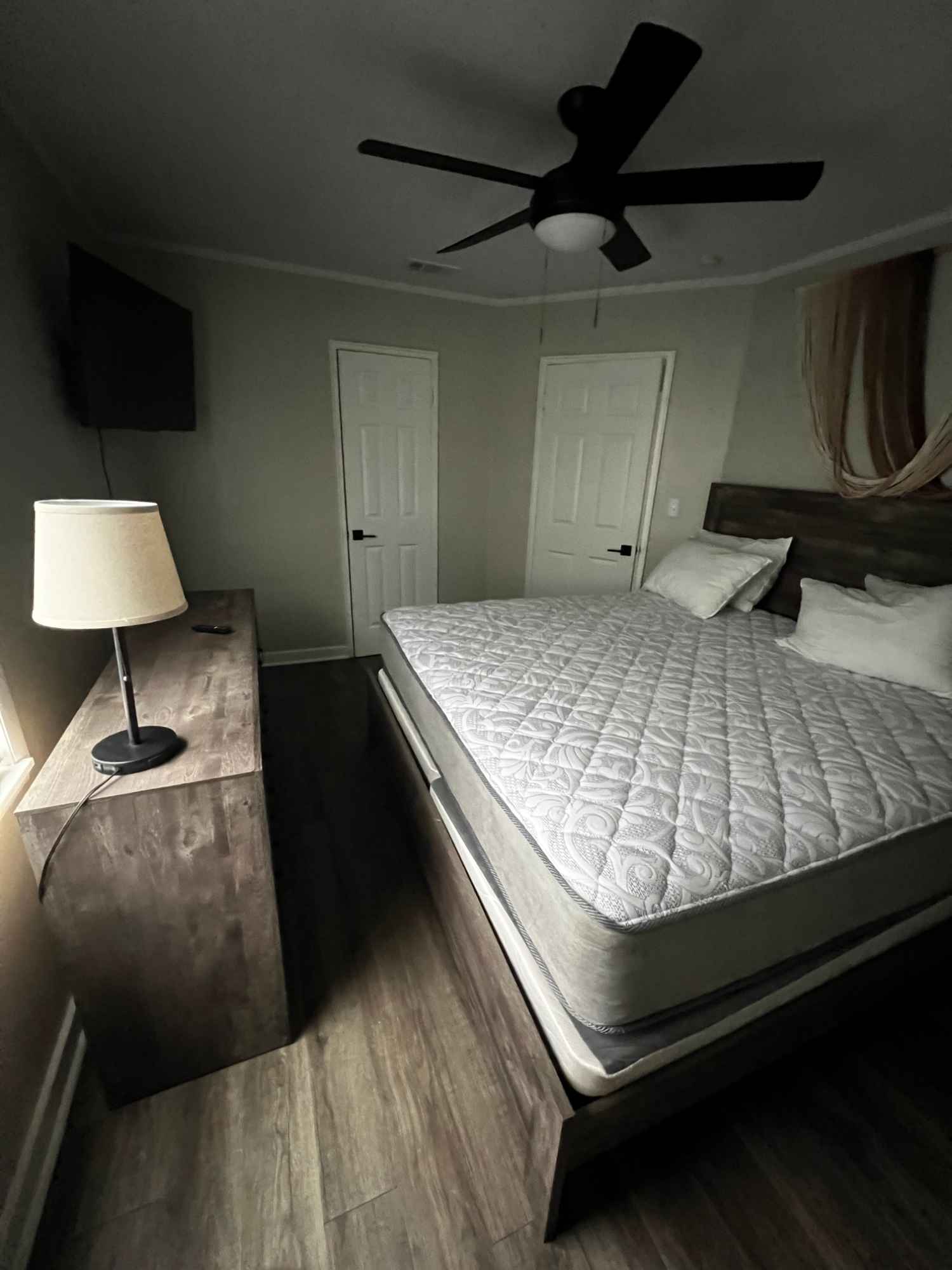 A fully furnished duplex in a very quiet neighborhood, the available room has a king sized bed, a Roku TV, a large dresser, bedside table, and closet, with free street parking. Application fee and background check will be required by management when applying for lease.