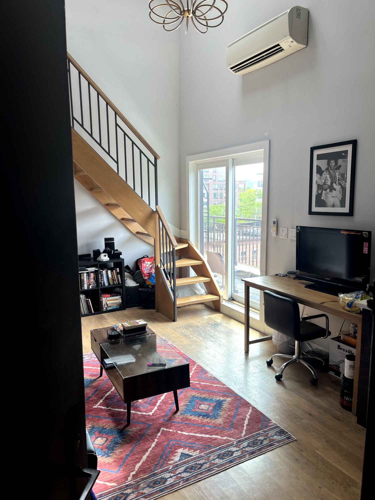 Wonderful big 20 foot ceilings in the living room. Has an in unit laundry unit in the basement. Great big kitchen with marble counters, humongous balcony that's 32 feet by 5 feet wide. 

It's a great spot especially for the price and location since it is in the middle of everything! You can make it to Grand Central Terminal in Manhattan in 40 min, and up to Willamsburg in 25 min. 