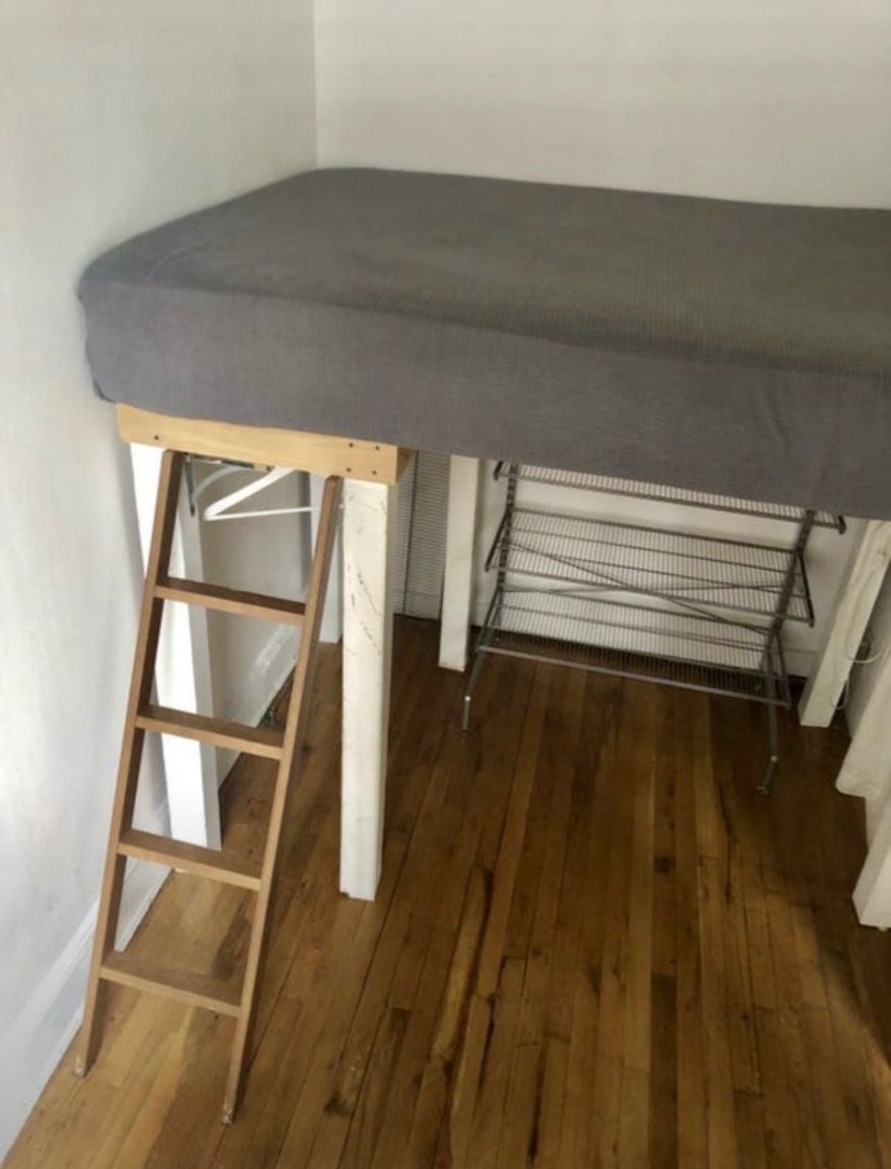 This room has a 10’ ceiling and has a full-sized loft bed with mattress and plenty of storage space below. It is in the front of the apartment and has a north-facing window providing a good amount of light.
Loft bed could be removed for long-term tenancy if desired.
Looking for someone who will co-habitate well. Not a party apartment, and not for having friends over all the time. Respecting the space and other roommates is key.
Smokers okay, but no smoking in apartment.