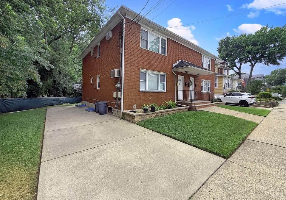 Spacious & bright first floor, 2 bedroom rental on a quiet, dead end block. Parking in driveway. Shared us of yard