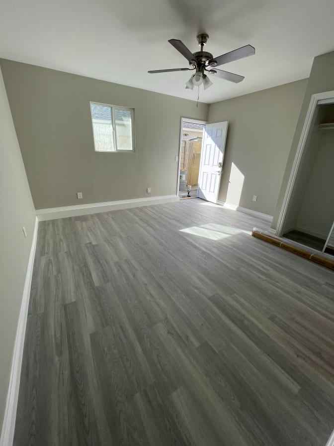 A private unfurnished studio with a private entrance, private bathroom, and a minimalistic indoor kitchen for light cooking only. The room is separate from the main house so that you won’t see us often. Plenty of street parking is available. The room has been recently remodeled, featuring new flooring, a new bathroom, and a new kitchen. You'll enjoy the beautiful morning sunlight in the room. The neighborhood is quiet and very safe for jogging, even at night. It's a 5-minute drive to Mile Square Park or Bella Terra. The rent includes all utilities and Wi-Fi. We are looking for a single, employed, or student female renter who is clean and considerate. Must provide proof of employment, the latest bank statements, and a current background check. No drugs, no smoking, no pets, and no visiting guests are allowed. Prefer long-term rentals or yearly leases. A $1,550 security deposit and $1,550 first month’s rent are required before moving in. 