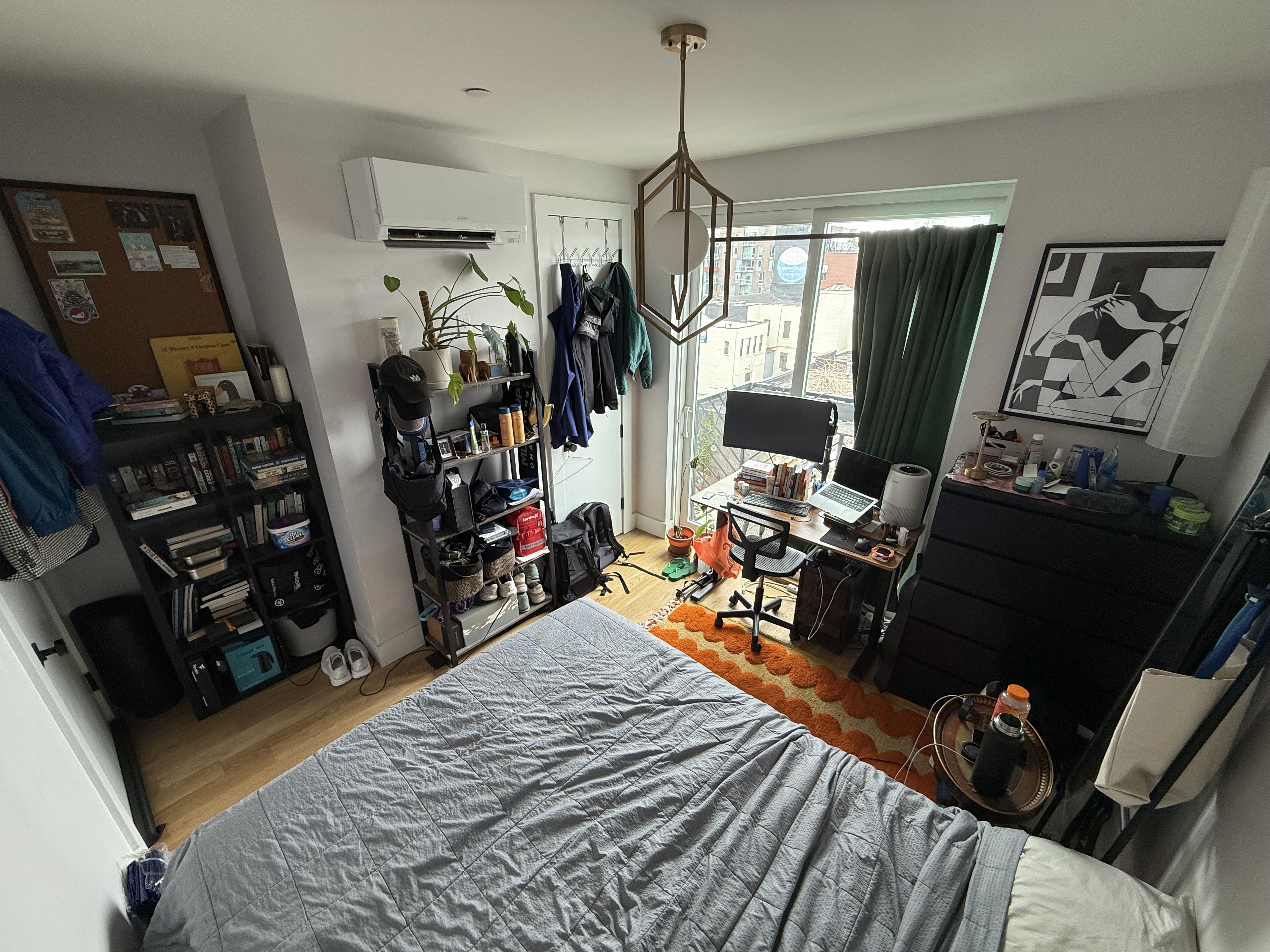 Spacious room (fits a queen-sized bed) with great light, closet, and a private balcony! The apartment itself is large 4-person duplex with 2 shared bathrooms, one on each floor. The building has an elevator and laundry, plus roof access and access to a gym in the building across the street. Hot water is included in the rent and each room has its own AC unit. I've lived here for almost 4 years now and have loved it, easily the largest and best apartment I've had in NYC.

All current roommates are friendly and down-to-earth, and either work fully remote or hybrid. We're a social crew but also a mix of introverts and extroverts, so while we love a good hang, everyone is respectful of each others' spaces and needs. Communication is easy, and we all maintain the space and chip in.