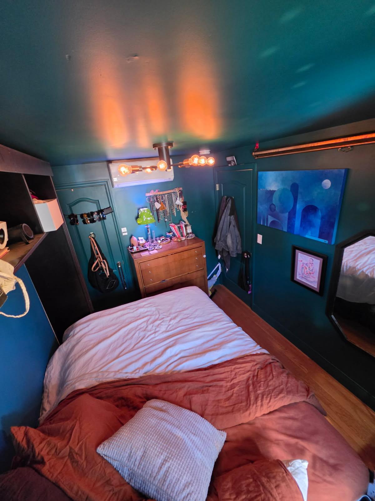 There are three here currently. One government worker, one hairstylist, and one pastry chef. We are all on the earlier side of things, and enjoy each others company. Sometimes we have friends over for dinner on the back deck or in the backyard. It is a very queer household. The room has a murphy bed that folds up into a desk if you have to WFH.